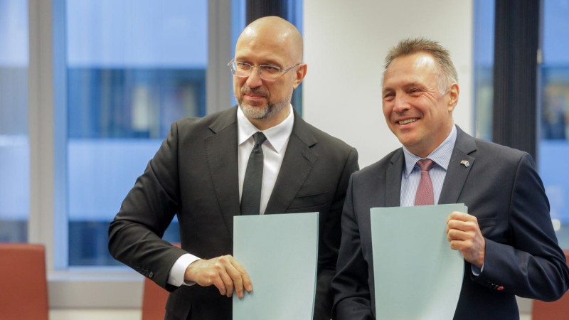 Denis Shmigal y Tore Sandvik
