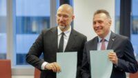 Denis Shmigal y Tore Sandvik